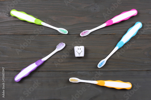 toothbrush tooth-brush on wood background. top view