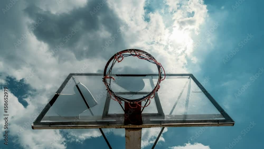 4K 30p Broken shattered basketball rim dramatic sky timelapse 4K 30p Broken shattered basketball rim dramatic sky timelapse