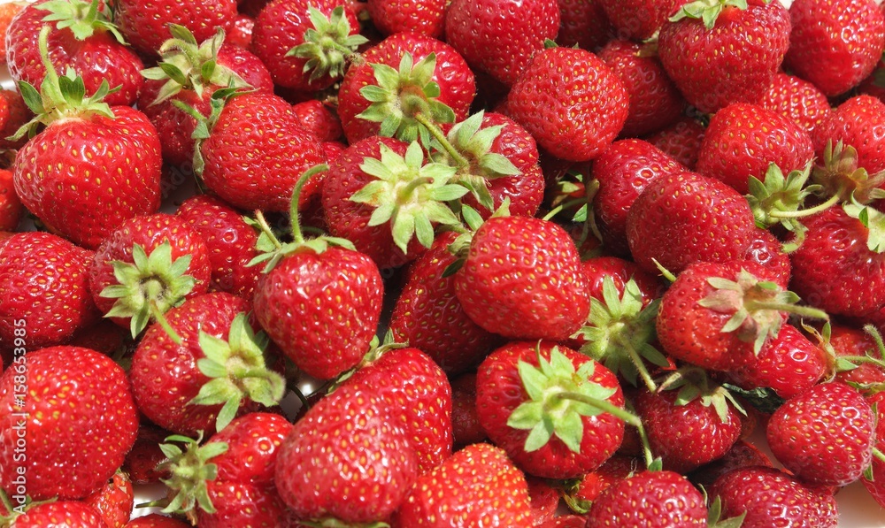 Still life, the white platter filled with strawberry Still life, the white platter filled with strawberry