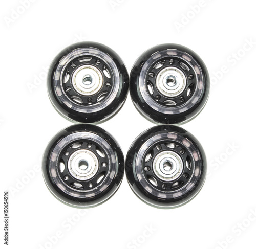 Inline skate wheels isolated over white
