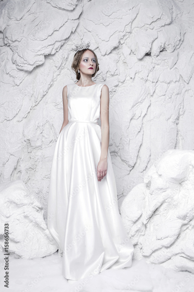 snow queen standing in ice and snow snow queen standing in ice and snow
