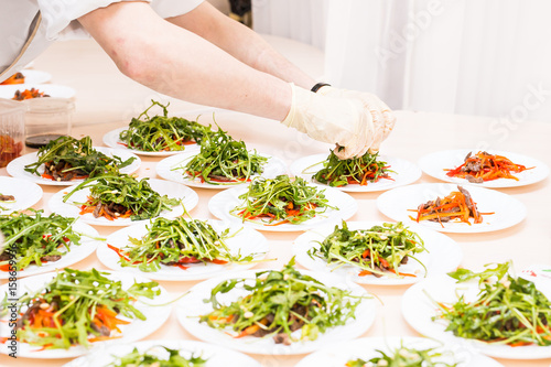 Close-up of chef cooking food kitchen restaurant cutting cook hands hotel man male knife preparation fresh preparing concept photo