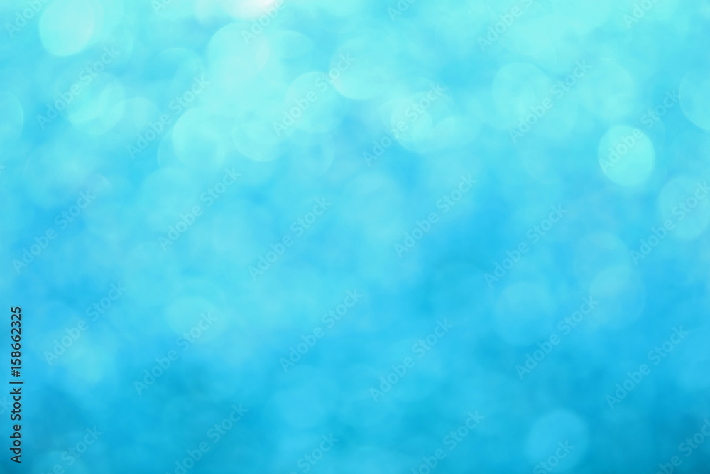 Blue winter bokeh lights abstract background Blue winter bokeh lights abstract background