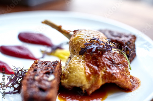 Duck Legs with Mashed Potato. Goose Legs with Cabbage, Croquette and orange Sauce.  duck with potatoes.