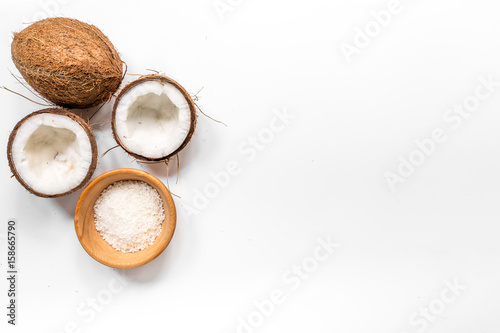 grated coconut for exotic food on white table background top view mock-up