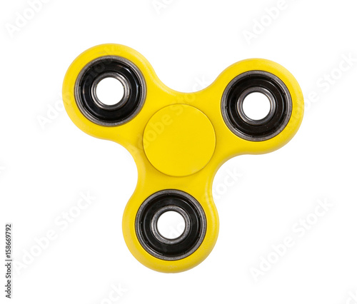Bild auf Leinwand Yellow Fidget Spinner on white background