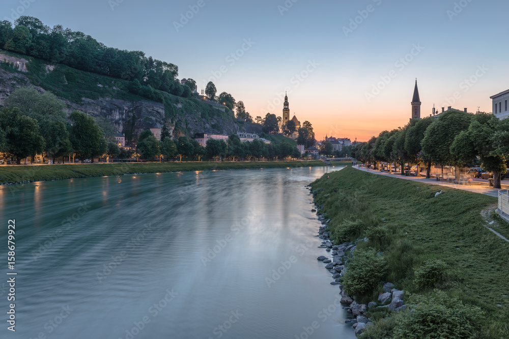 Beautiful old town with the river at sunset - Salzburg, Austria