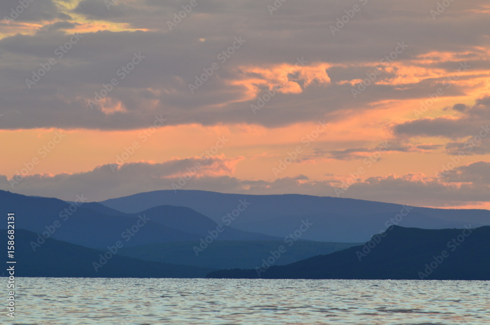 sunset  sky sea mountain landscape