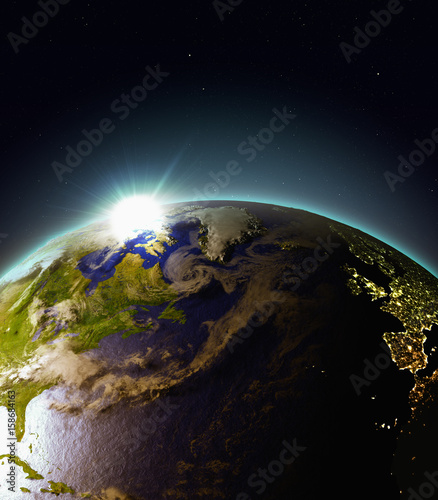 Fototapeta Naklejka Na Ścianę i Meble -  Sunrise above North Atlantic from space