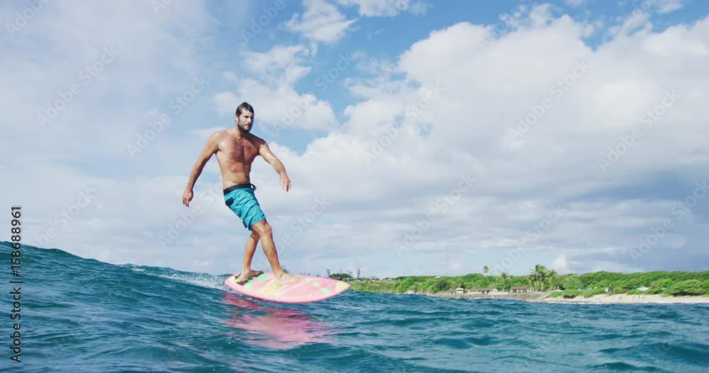 Surfer on hydrofoil surfboard riding blue ocean wave. Futuristic ...