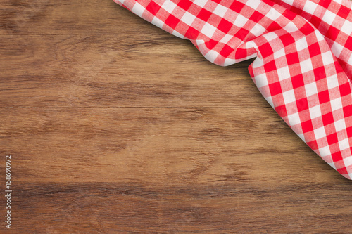 Tablecloth on wood table background