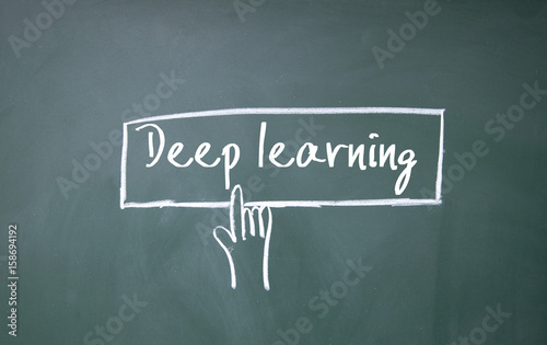 finger click deep learning symbol on blackboard