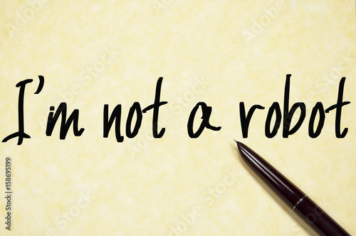 I am not a robot text write on paper