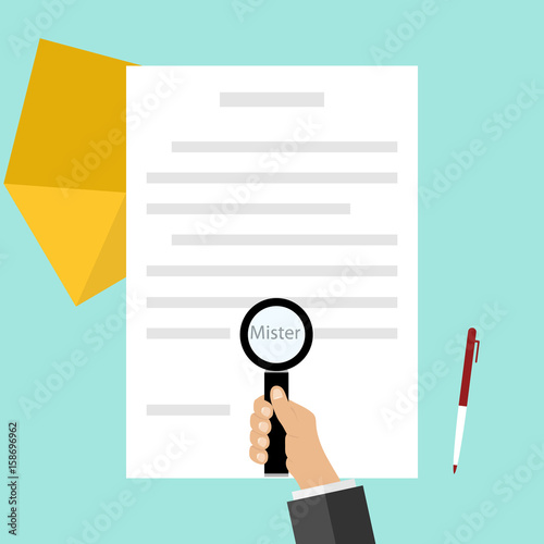 A hand with a magnifying glass looks at the document