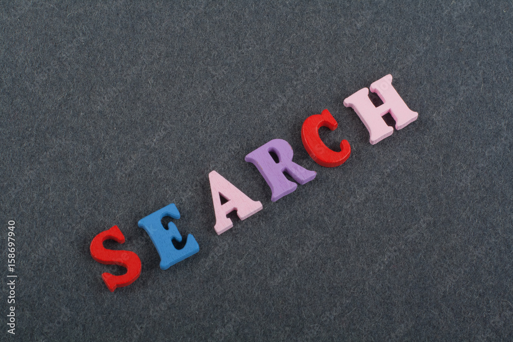 SEARCH word on black board background composed from colorful abc alphabet block wooden letters, copy space for ad text. Learning english concept. SEARCH word on black board background composed from colorful abc alphabet block wooden letters, copy space for ad text. Learning english concept.