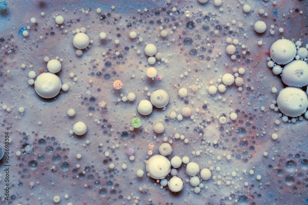 Colourful and beautiful effect of water paint and oil mixing. Multicoloured abstract bubbles. Colourful and beautiful effect of water paint and oil mixing. Multicoloured abstract bubbles.