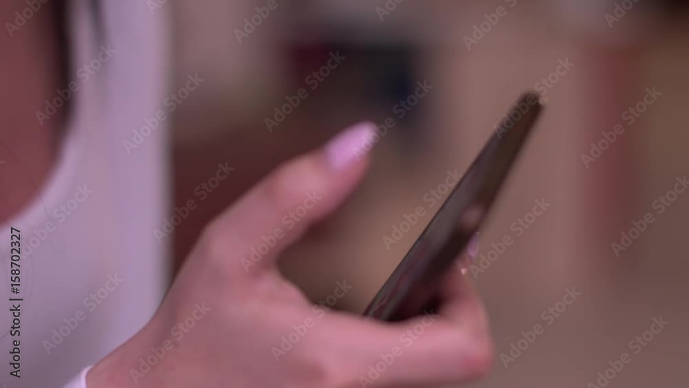 Closeup of woman hands using smartphone. Closeup of woman hands using smartphone.