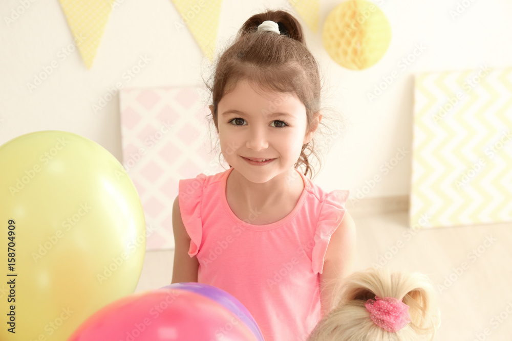 Cute little girl at birthday party