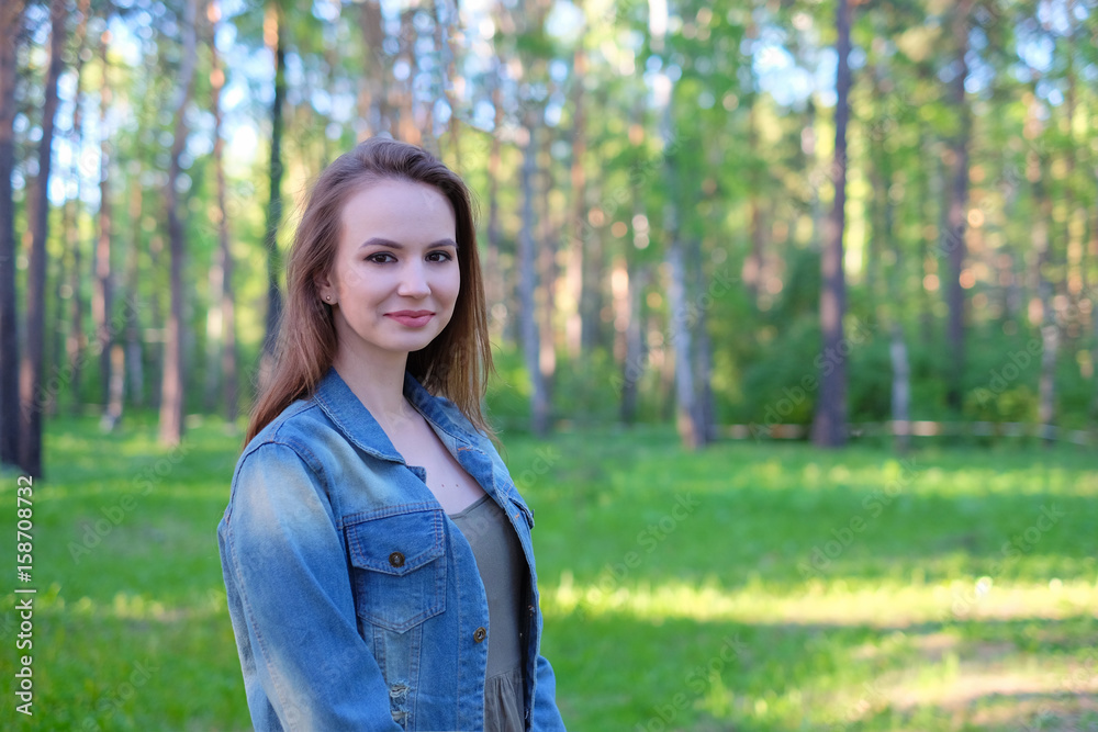 Beautiful young woman in the park. Outdoor portrait Beautiful young woman in the park. Outdoor portrait