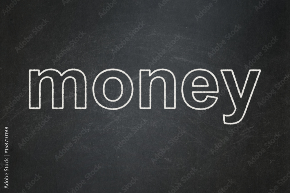 Fototapeta premium Money concept: Money on chalkboard background