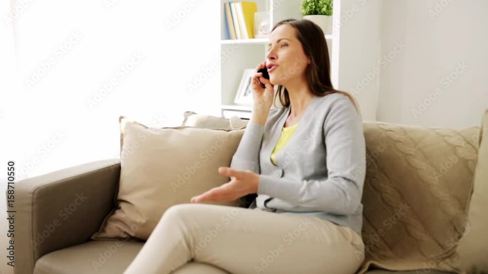happy woman calling on smartphone at home happy woman calling on smartphone at home