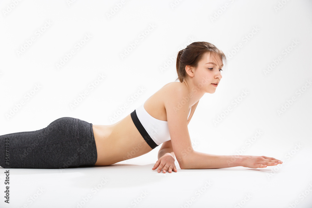 Young woman exercise yoga supported headstand Young woman exercise yoga supported headstand
