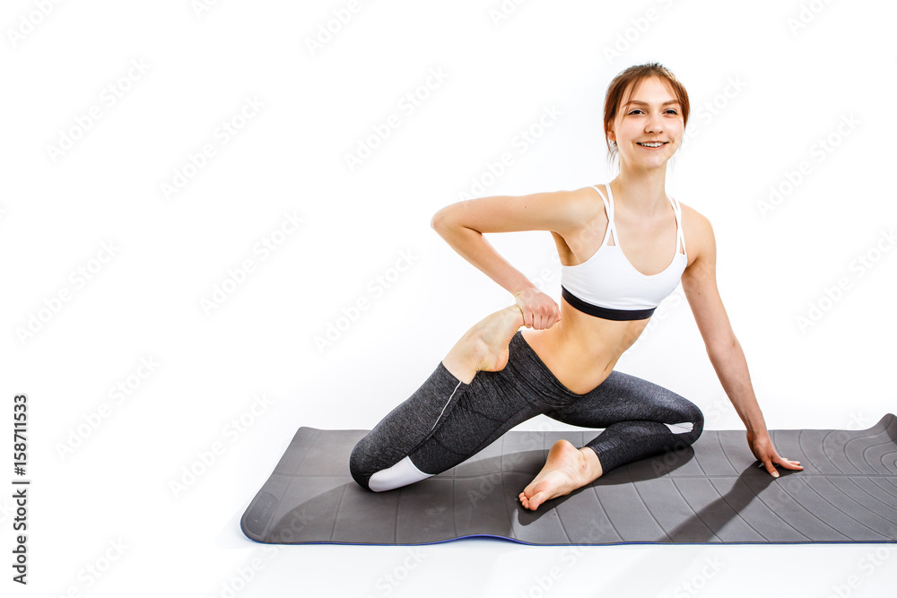 Woman doing exercises on mat Woman doing exercises on mat