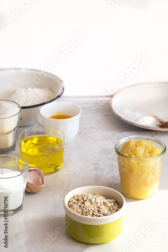 Baking ingredients for pastry on white wooden rustic table. Step by step recipe. 