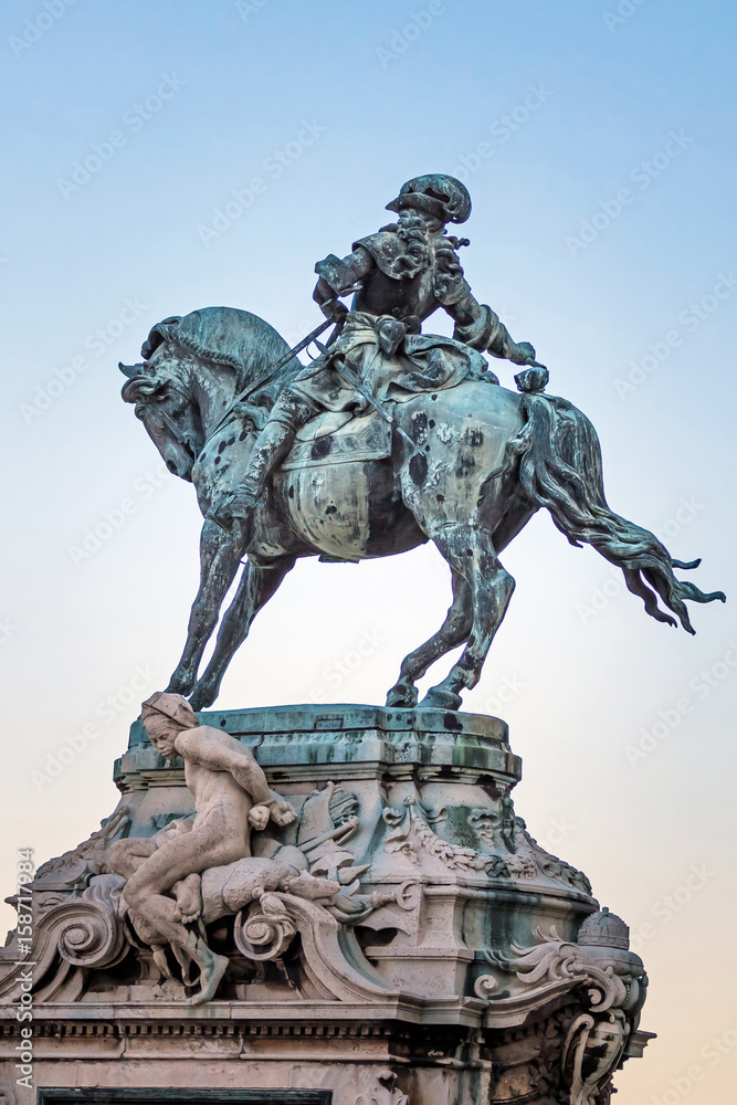 Fototapeta premium Statue of Prince Savoyai Eugen in front of the historic Royal Palace in Buda Castle. Budapest, Hungary
