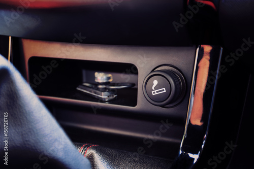 The Car cigarette lighter in a car interior. selective fous. photo