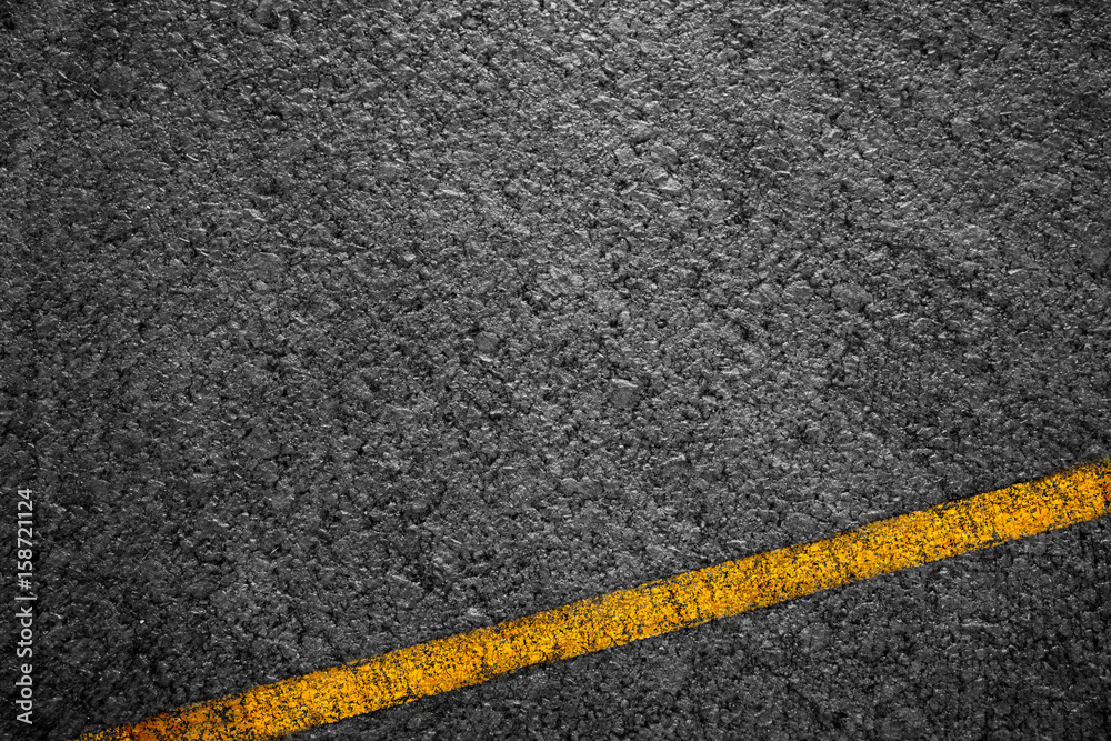 Fototapeta premium Asphalt background texture with some fine grain with Yellow Stripe