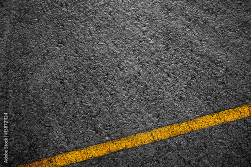 Wallpaper Mural Asphalt background texture with some fine grain with Yellow Stripe Torontodigital.ca