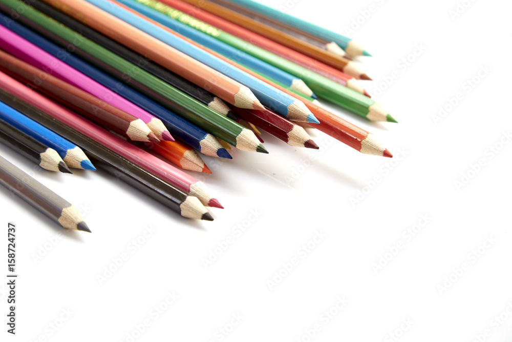 Many different colored pencils on white background Many different colored pencils on white background
