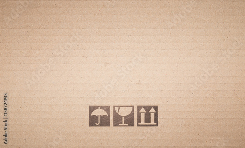 Symbol box Paper texture brown sheet background.