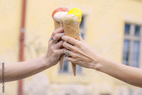 Tasty ice cream in beautiful female hands