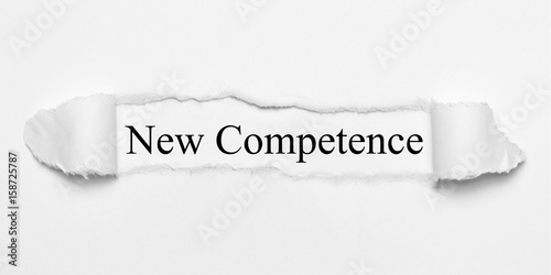 Foto New Competence on white torn paper