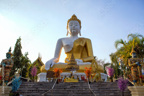 Buddha statue Wat Phra That Doi Kham at Chiang Mai,Thai temple Northern Thailand