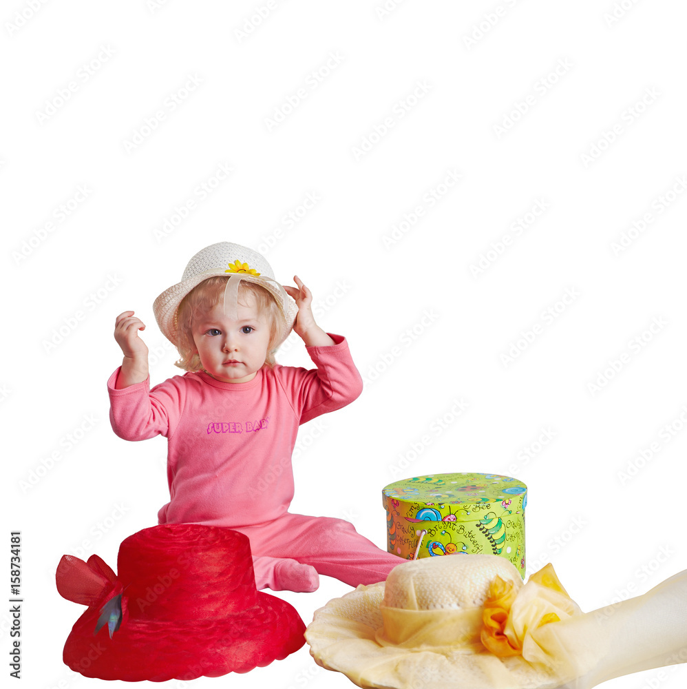 Small girl with hats shopping problems concept Small girl with hats shopping problems concept