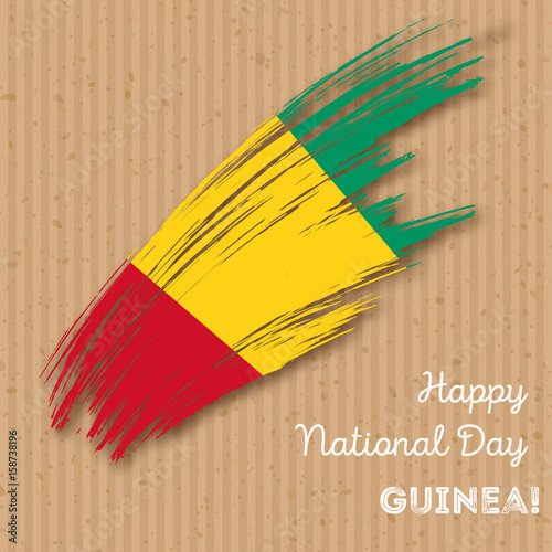 Guinea Independence Day Patriotic Design. Expressive Brush Stroke in National Flag Colors on kraft paper background. Happy Independence Day Guinea Vector Greeting Card.