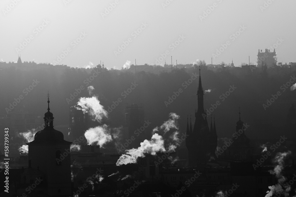 Silhouette of roofs old town of Prague in morning  light.