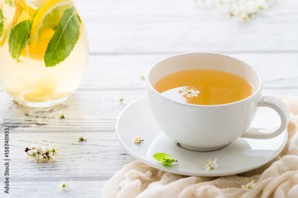 Fresh herbal tea with blooming brunch Fresh herbal tea with blooming brunch