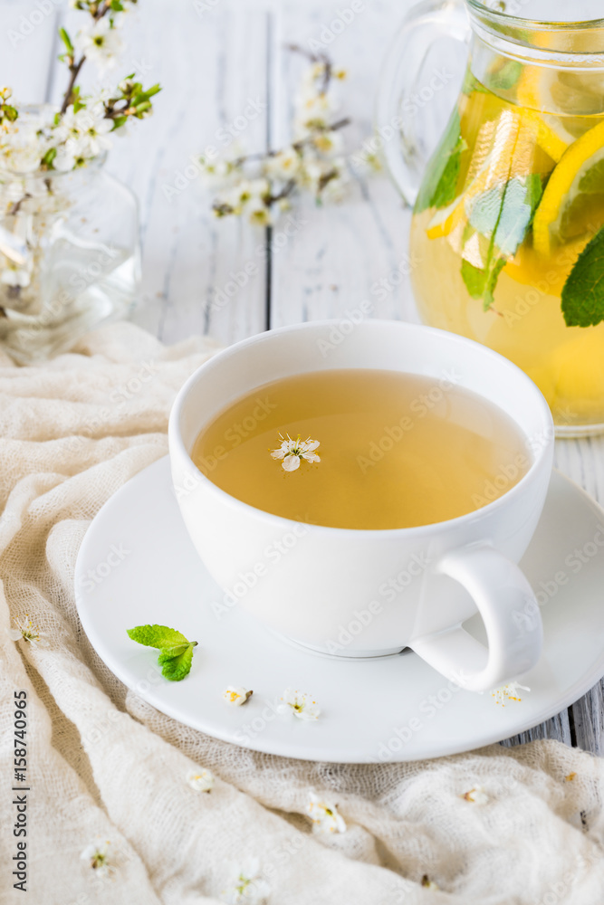 Fresh herbal tea with blooming brunch Fresh herbal tea with blooming brunch