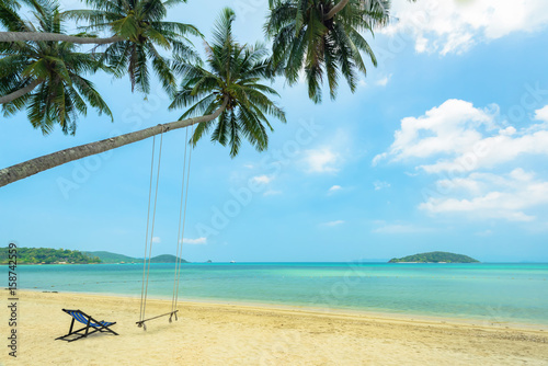 Beautiful tropical beach  Chair beach and swing for relaxation