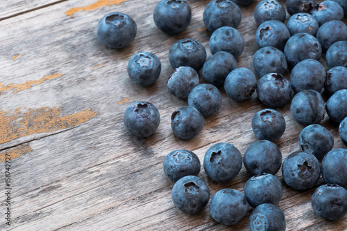 Ripe blackberries on plank