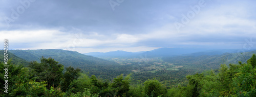 Mountains under mist in the morning. panorama view