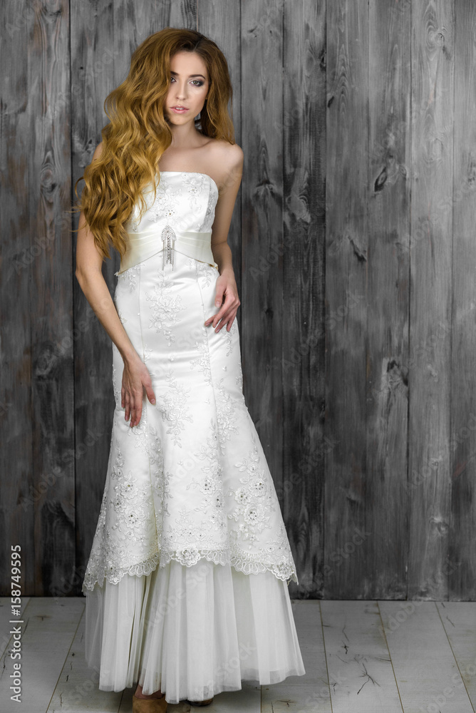 Beautiful girl in white evening dress Beautiful girl in white evening dress
