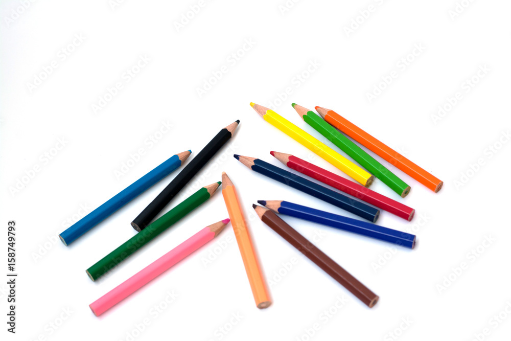 Color pencils on white background, copy space. Color pencils on white background, copy space.