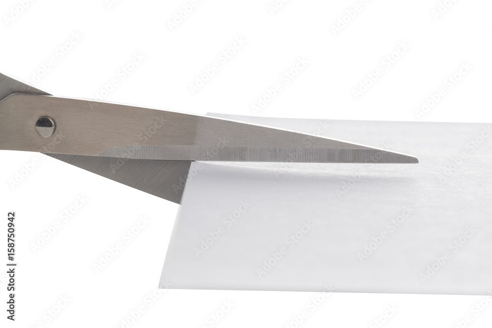 Scissors cutting a paper on the white background. Scissors cutting a paper on the white background.