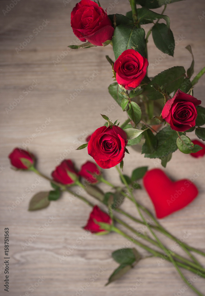 Red rose on old wood background (top view) Red rose on old wood background (top view)