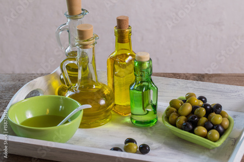 Olive oil on the wooden table